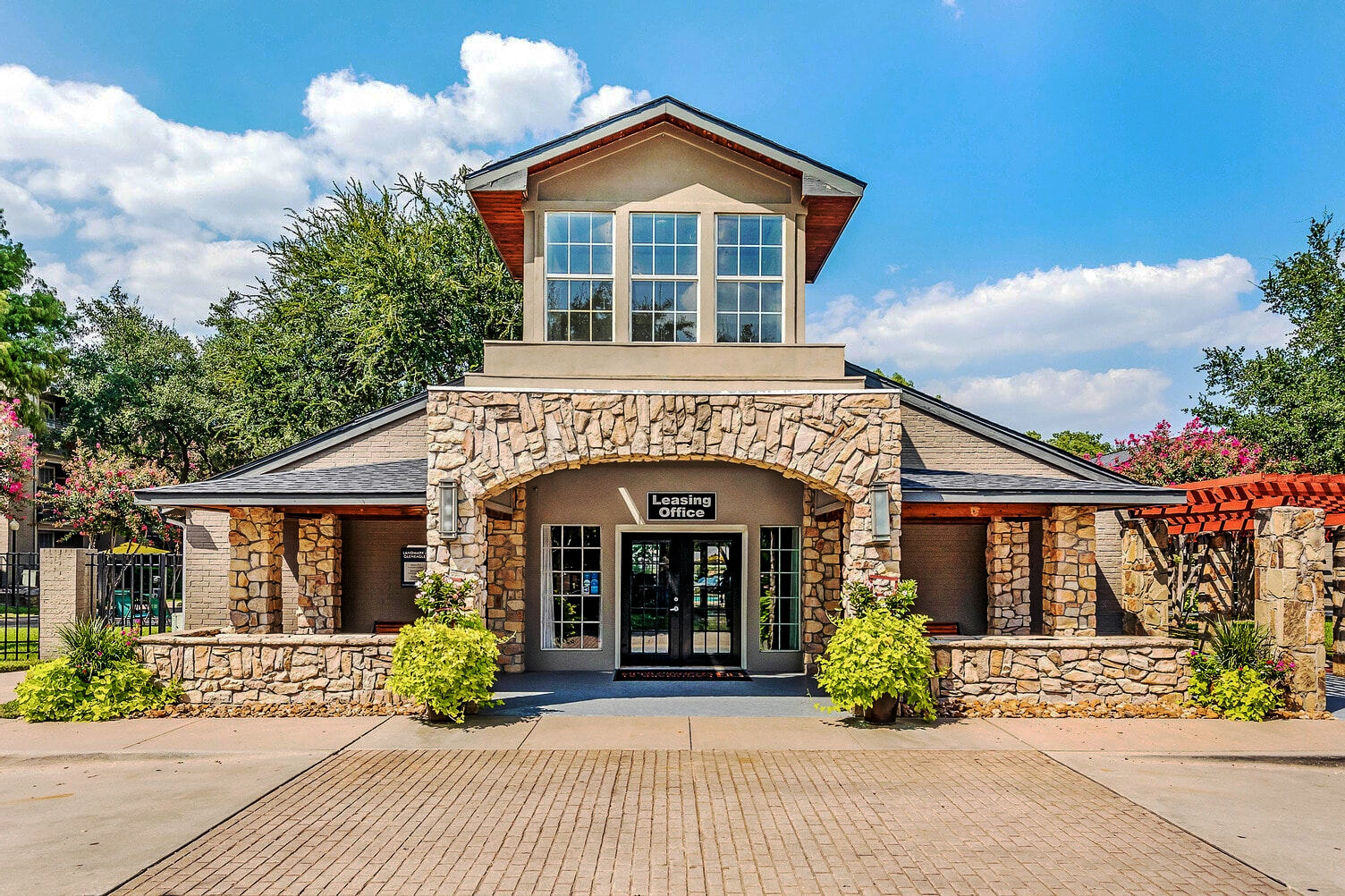 the entrance to a building with stone and brick at The  Monte